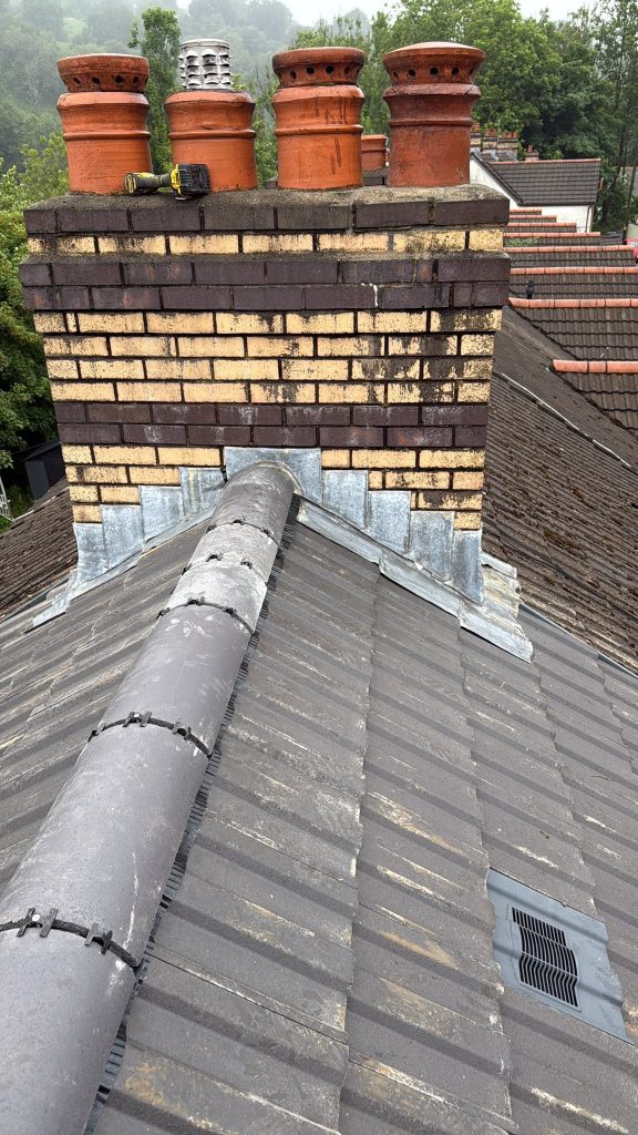 New tiled roof with ridge tiles and chimney in Crumlin